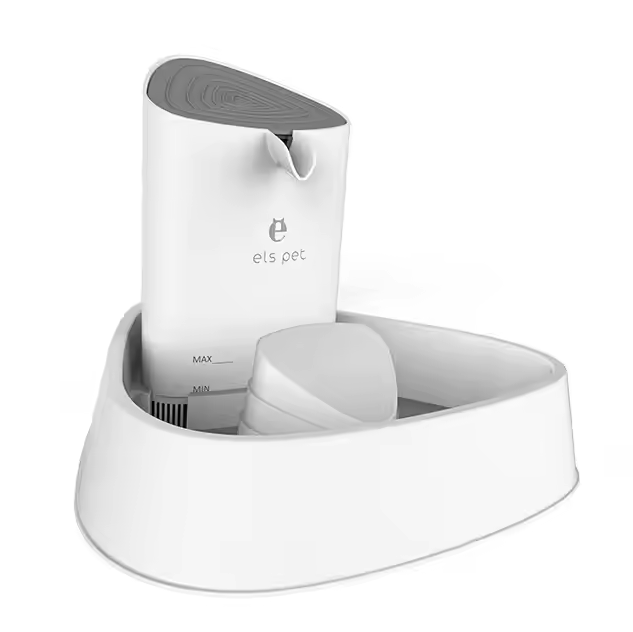 Close-up of an automatic pet water fountain providing fresh, filtered water for happy dogs & cats' hydration.