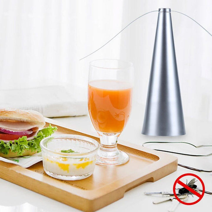 Tabletop fly repellent fan for outdoor living. Enjoy bug-free BBQs & gatherings with this silent pest control device.