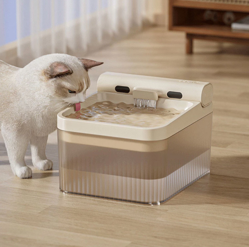 Automatic pet water fountain with triple filtration system for cats & dogs, ensuring fresh, clean water.