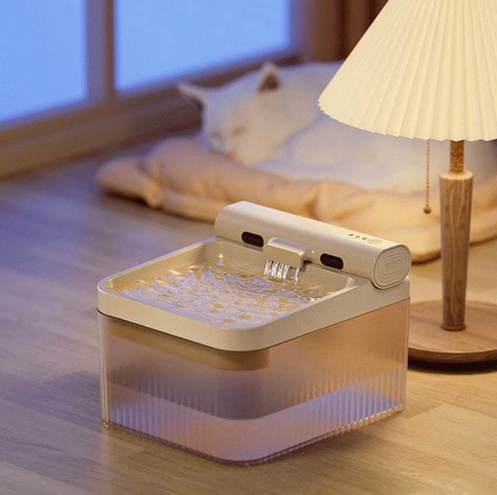 Quiet automatic pet fountain for cats & dogs promotes healthy hydration with a triple filtration system.