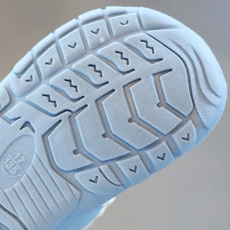 Newborn flexible shoes, ensuring secure and comfortable first steps development.