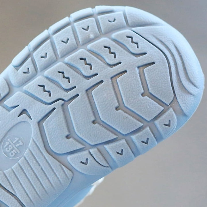Newborn flexible shoes, ensuring secure and comfortable first steps development.
