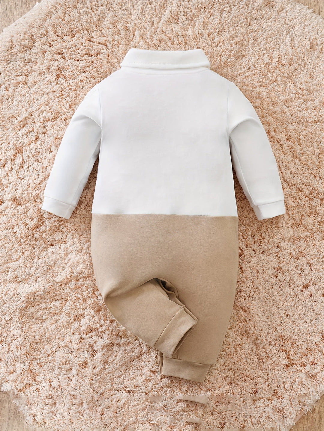 Cotton baby boy romper featuring a dapper bow tie, perfect for special occasions.