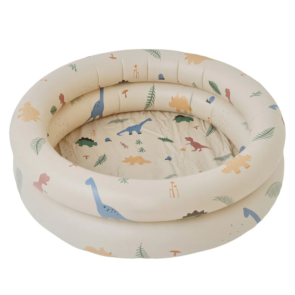Blue and white inflatable toddler pool for backyard water play