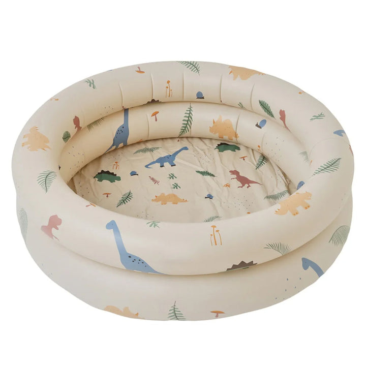 Blue and white inflatable toddler pool for backyard water play