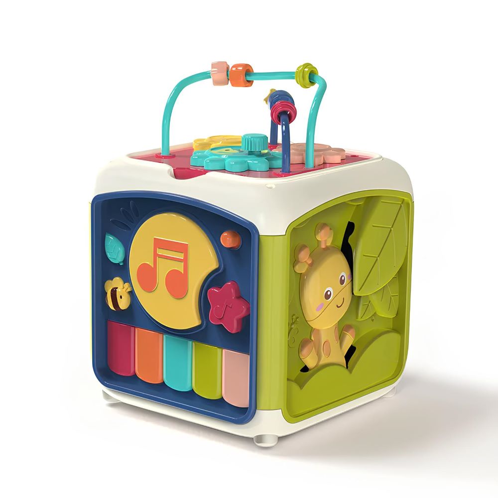 Close-up of a baby exploring shapes on an educational musical activity cube.