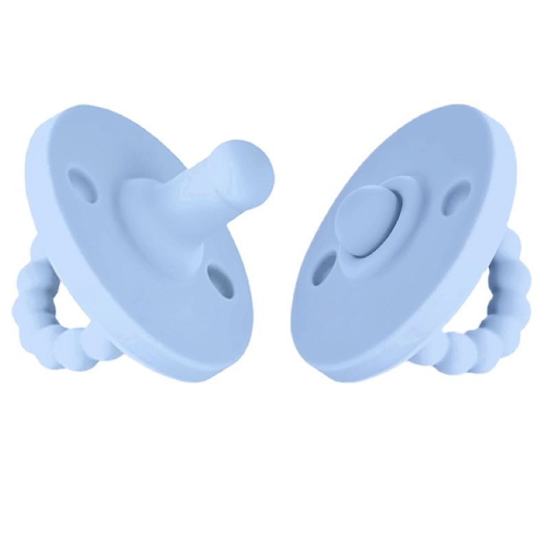 Baby silicone pacifier soothing a fussy infant, perfect for 0-24 months.