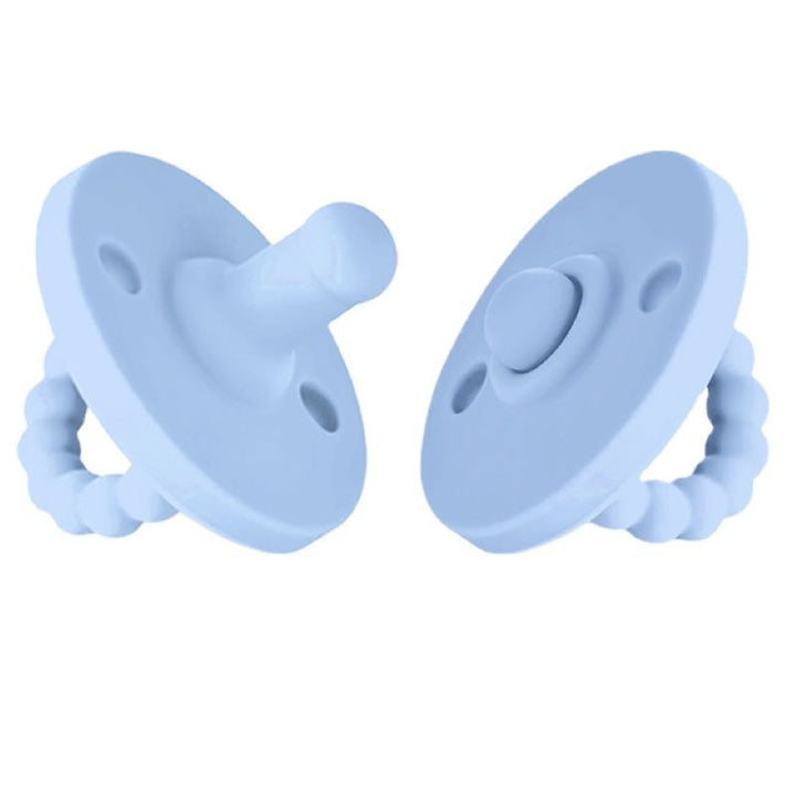 Baby silicone pacifier soothing a fussy infant, perfect for 0-24 months.
