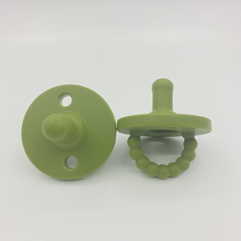 Soothing toy: a soft silicone pacifier to calm and comfort your little one.