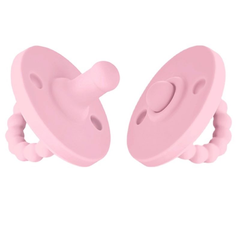 Teething relief pacifier with a textured surface to massage sore infant gums.