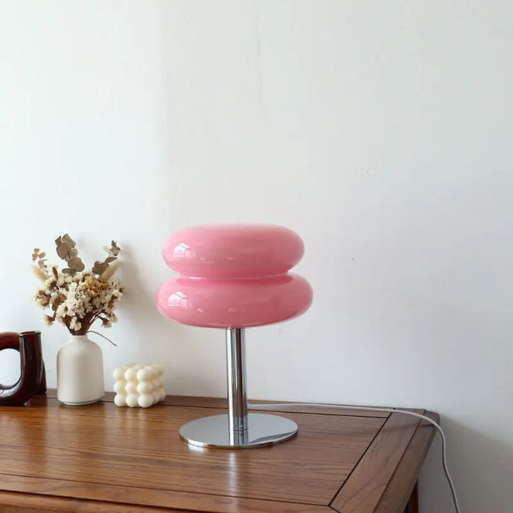 Elegant Bauhaus-style dimmable LED table lamp. Provides warm, atmospheric lighting for any modern interior.