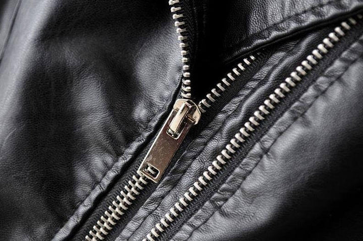 Essential women's black biker jacket, classic asymmetrical style, versatile fashion outerwear.
