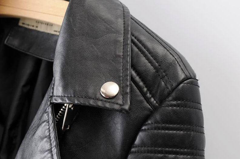 Versatile black women's biker jacket, classic asymmetrical style for all-season chic outerwear.