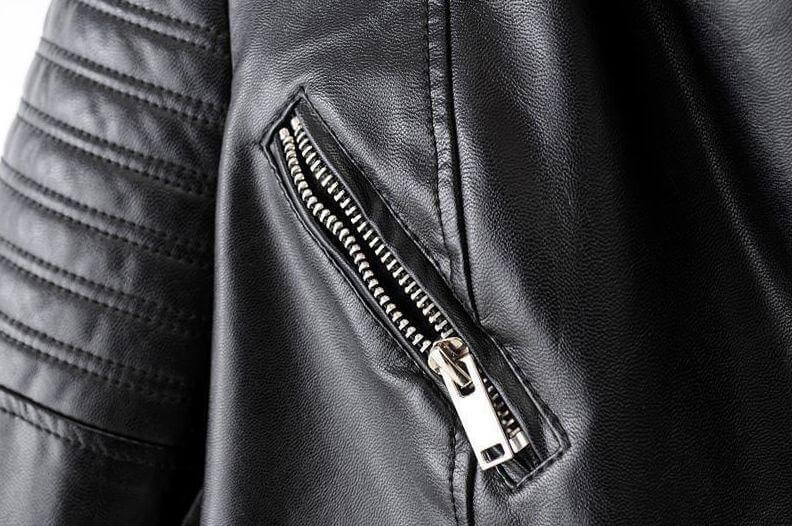 Modern women's asymmetrical black biker jacket, a classic style for versatile fashion outerwear.