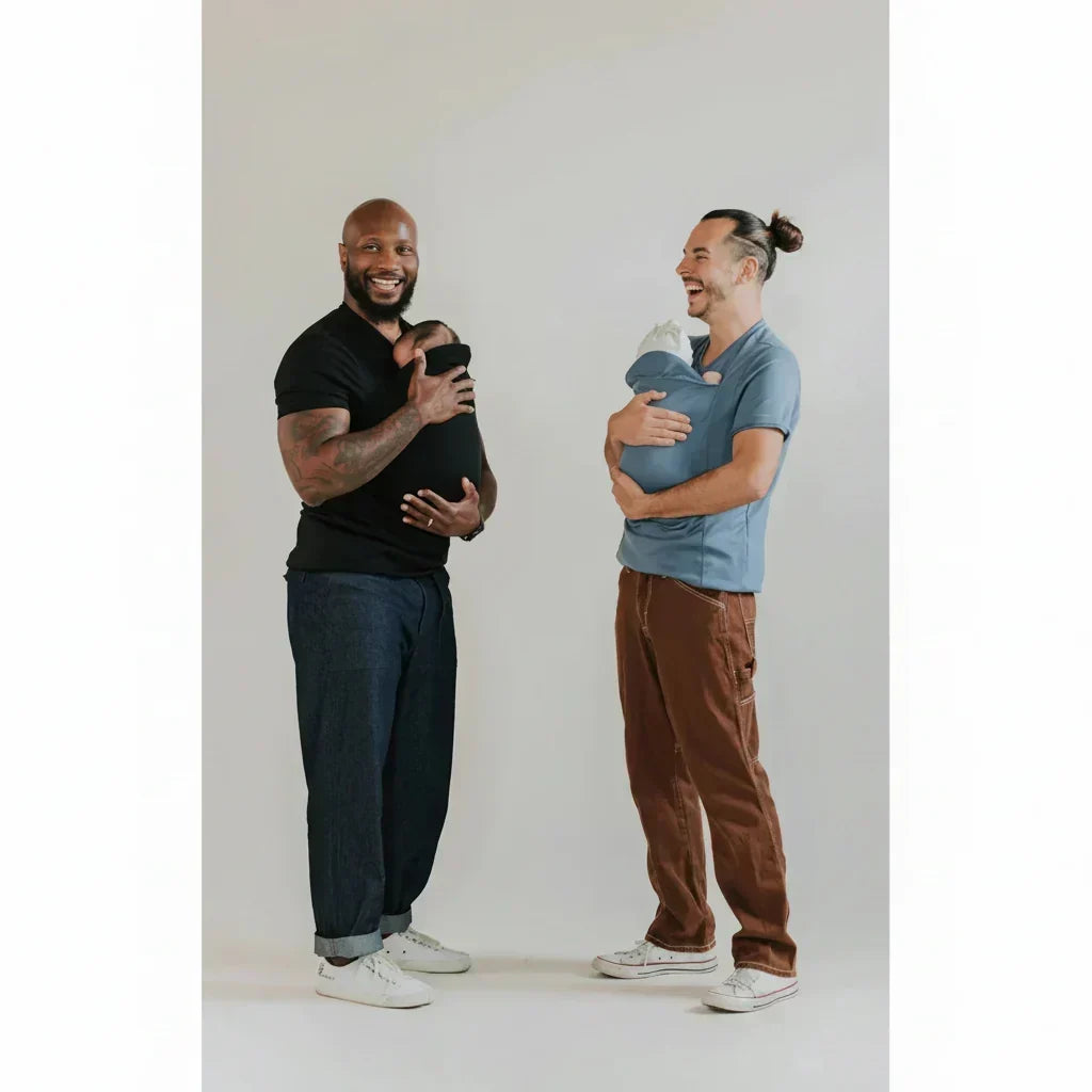 Comfortable black baby carrier shirt, designed for secure hands-free newborn babywearing.
