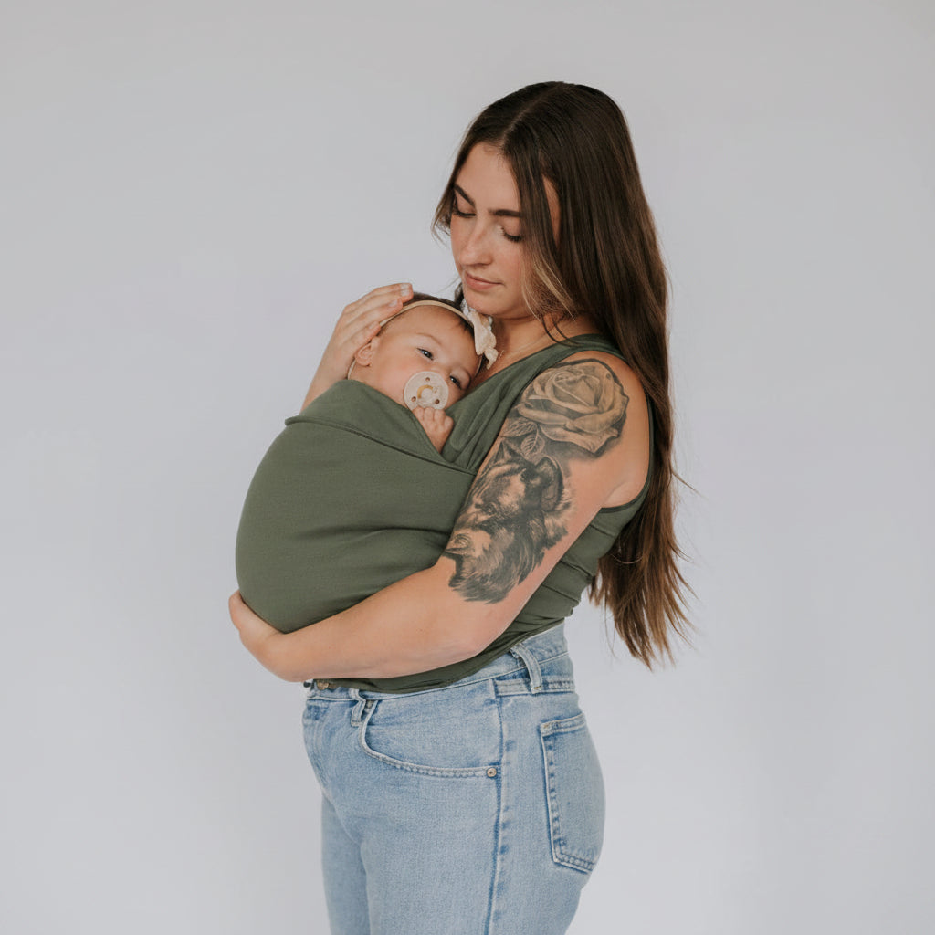 Mom shirt with hands-free newborn baby carrier, featuring a secure pouch for close bonding.