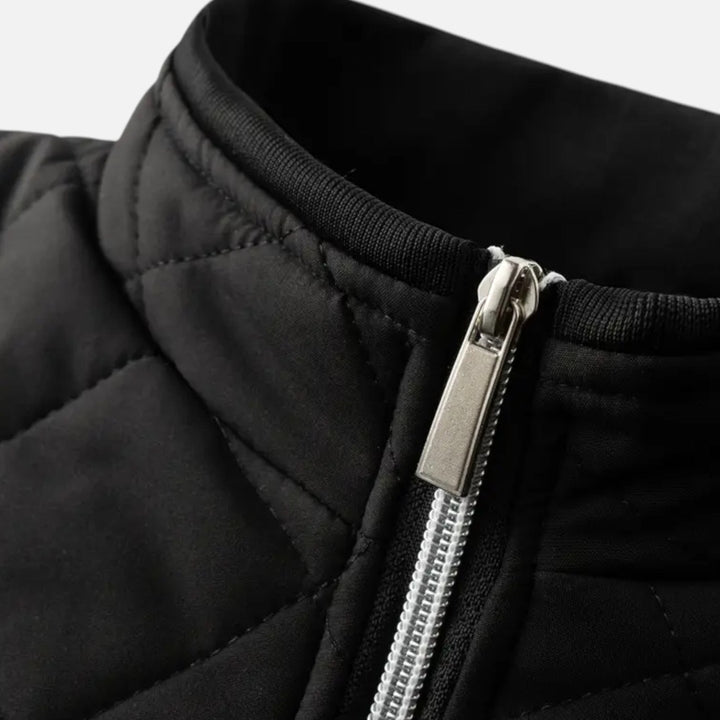 Grey quilted winter jacket for men, warm full-zip everyday outerwear.