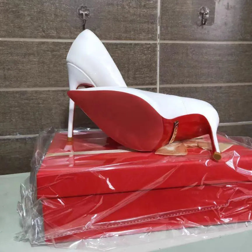 Step out in style with these women's patent leather pointed toe stiletto heels.