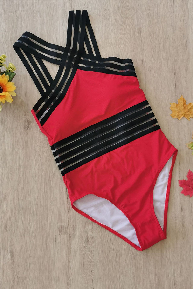 Elegant black women's monokini, flattering crossed strappy one-piece swimsuit.