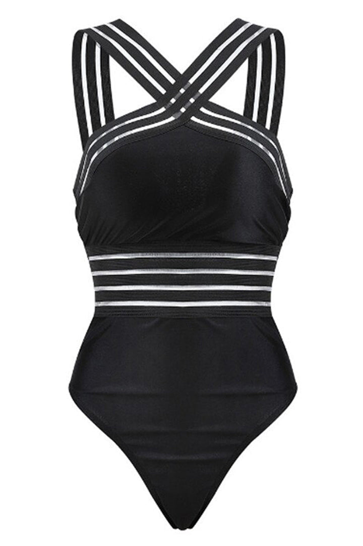 Chic red monokini swimsuit, flattering strappy crossed one-piece for resort.