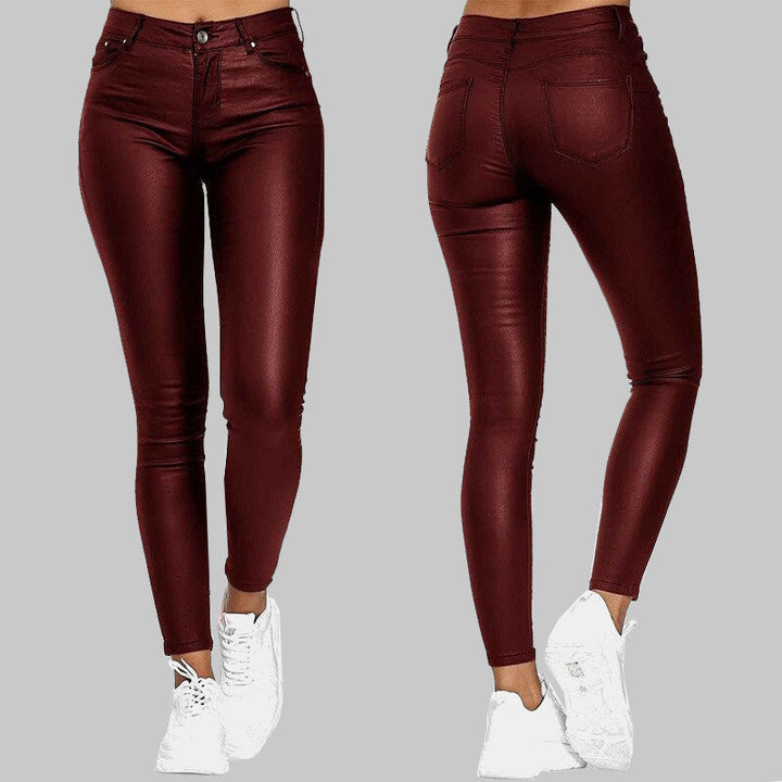 Unisex Skinny High-Waist Pants in black, red, or blue, offering a comfortable, flattering slim fit.