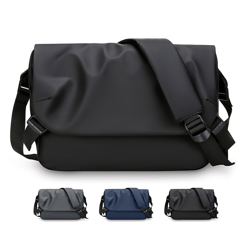 Black unisex waterproof messenger bag for commuting. Durable, fits laptops, ideal for travel & everyday use.