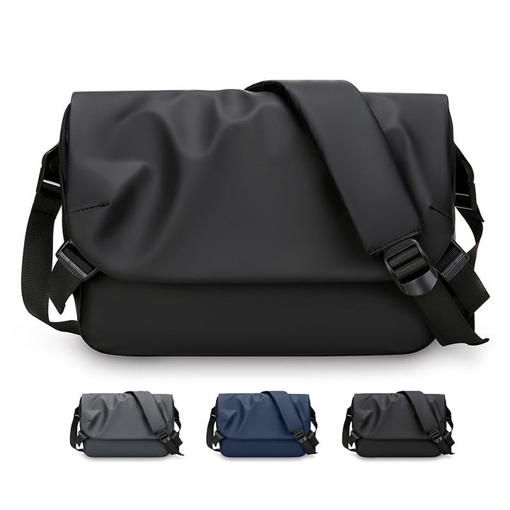 Black unisex waterproof messenger bag for commuting. Durable, fits laptops, ideal for travel & everyday use.