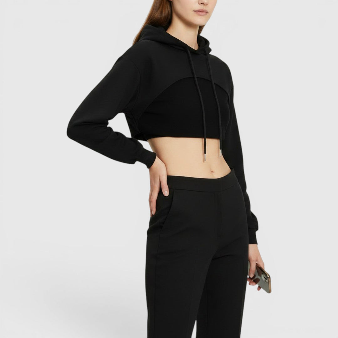 Versatile black women's cropped hooded sweatshirt pullover for a comfortable, modern casual look.