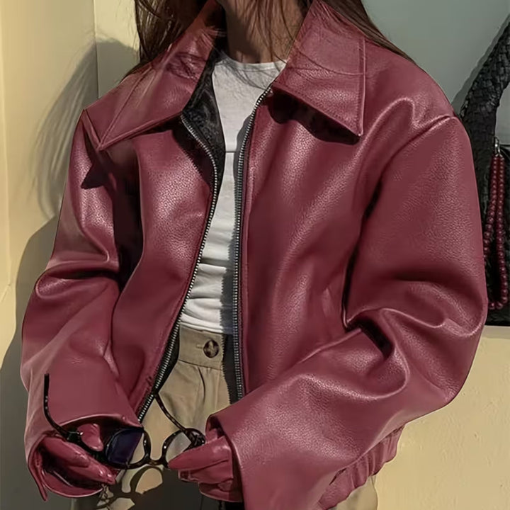 Statement women's moto jacket, casual with elegant lapel collar, perfect for fashion-forward looks.