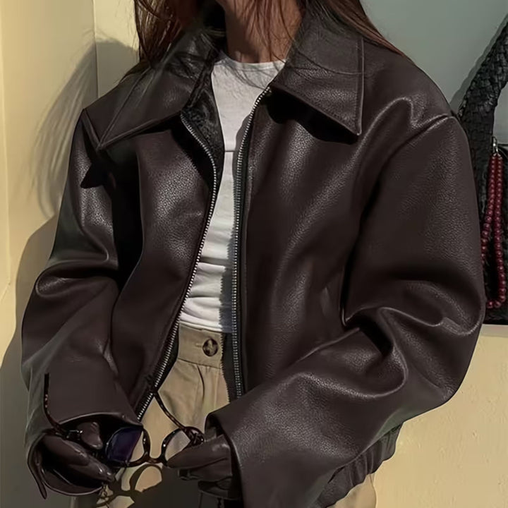 Women's stylish moto jacket, featuring a smart lapel collar for contemporary casual wear.