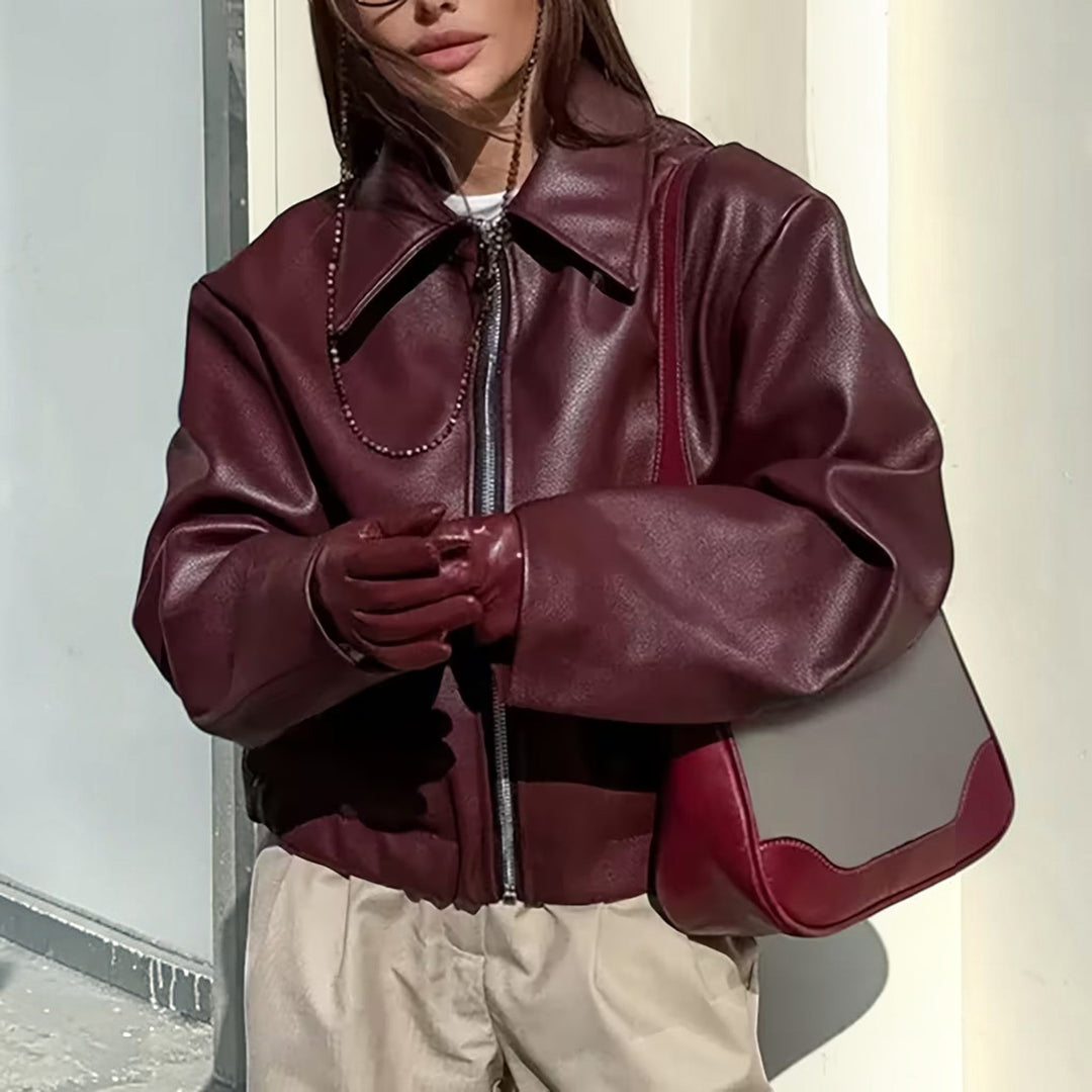 Classic women's moto jacket with a modern lapel collar, perfect for versatile fashion.