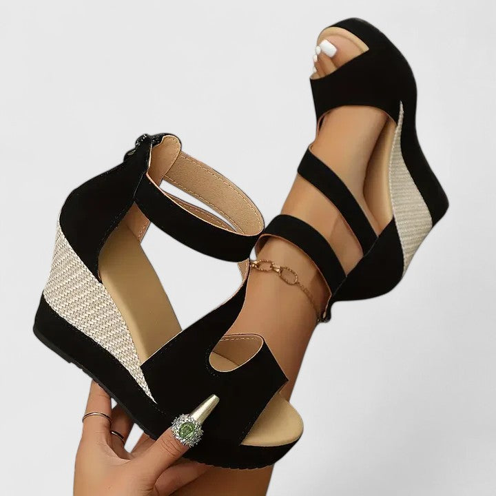 Women's casual black wedge sandals, offering comfort for summer and holiday wear.