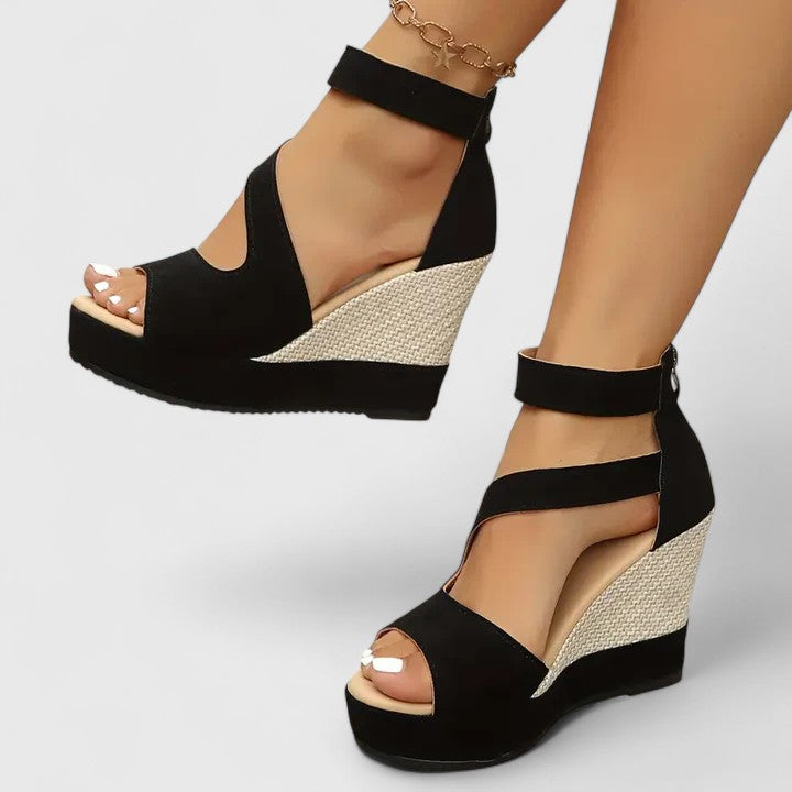 Women's black wedge sandals, designed for ultimate comfort and summer style.