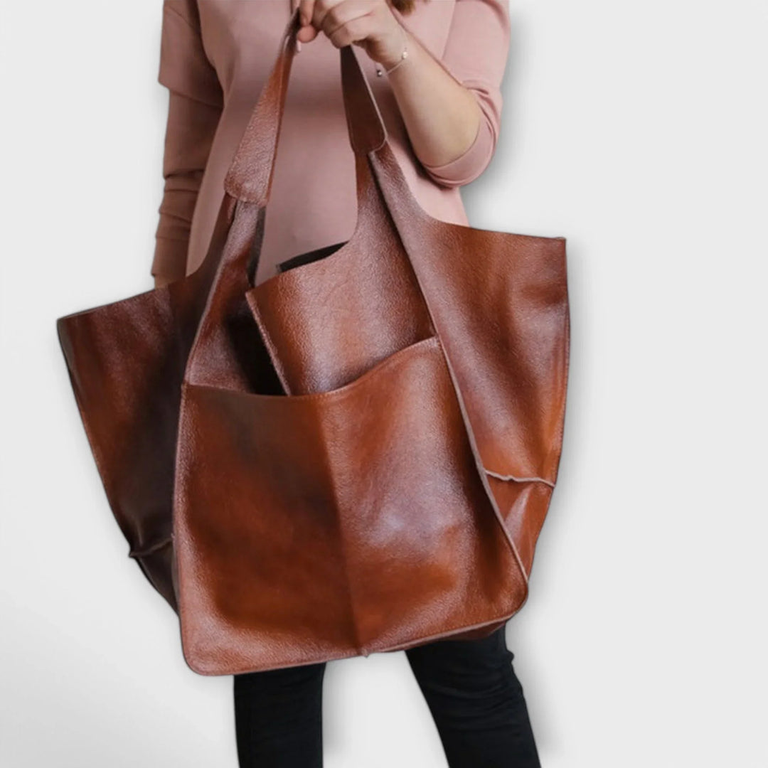 Trendy khaki faux leather tote, women's spacious bag, ideal for modern urban style.
