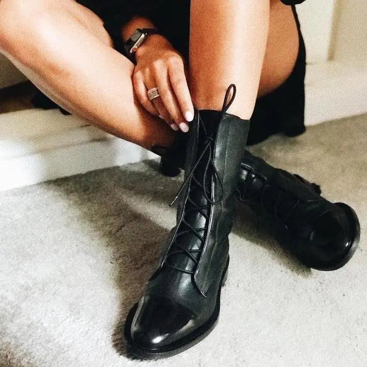 Classic brown lace-up ankle boots for women. Stylish, comfortable & perfect for any occasion.