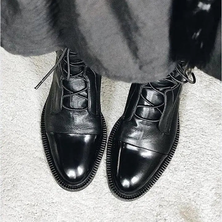 Women's classic black lace-up ankle boots. Stylish design offers ultimate comfort & versatility.