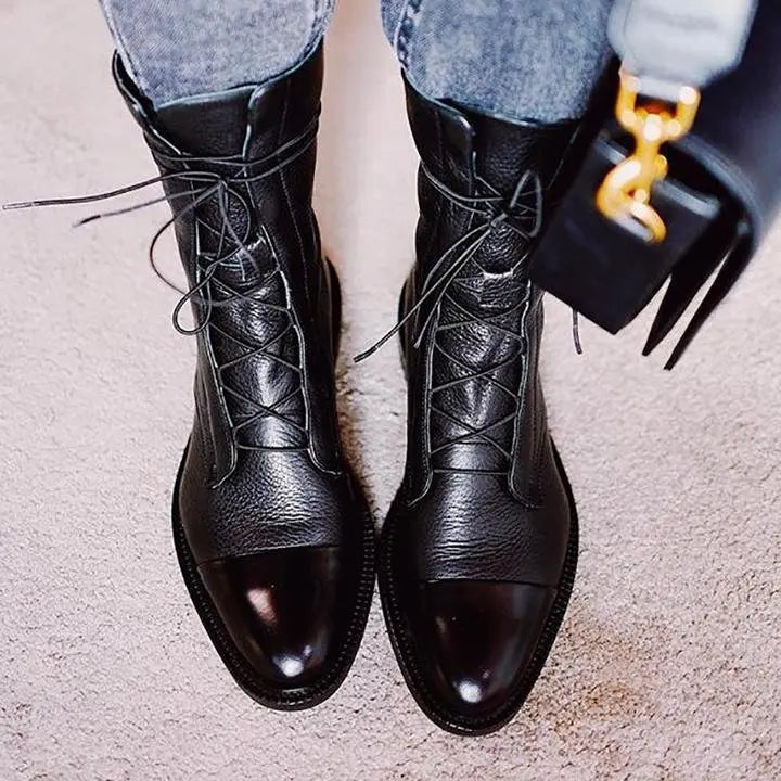 Comfortable brown lace-up ankle boots for women. Versatile footwear for autumn & winter style.