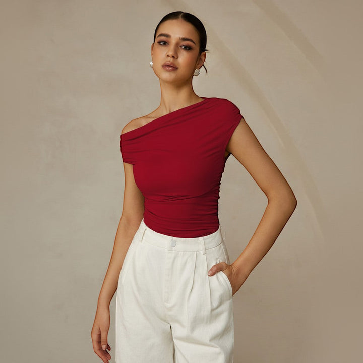 Casual light green fitted top, one shoulder style with ruched texture & asymmetrical design.