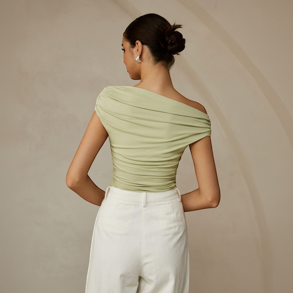 Light green one shoulder ruched top, fitted & asymmetrical for summer casual wear.