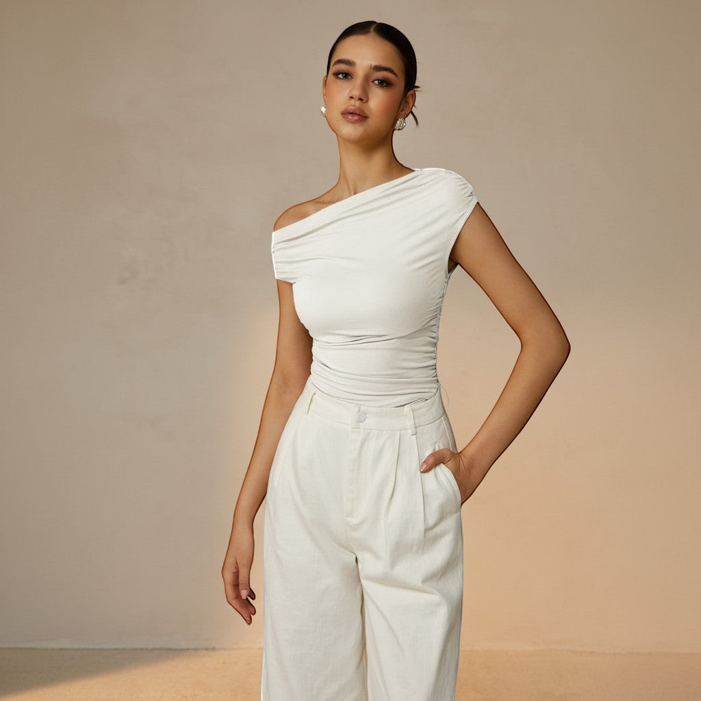 Soft ruched women's one shoulder top in black, fitted & sleeveless with an asymmetrical cut.