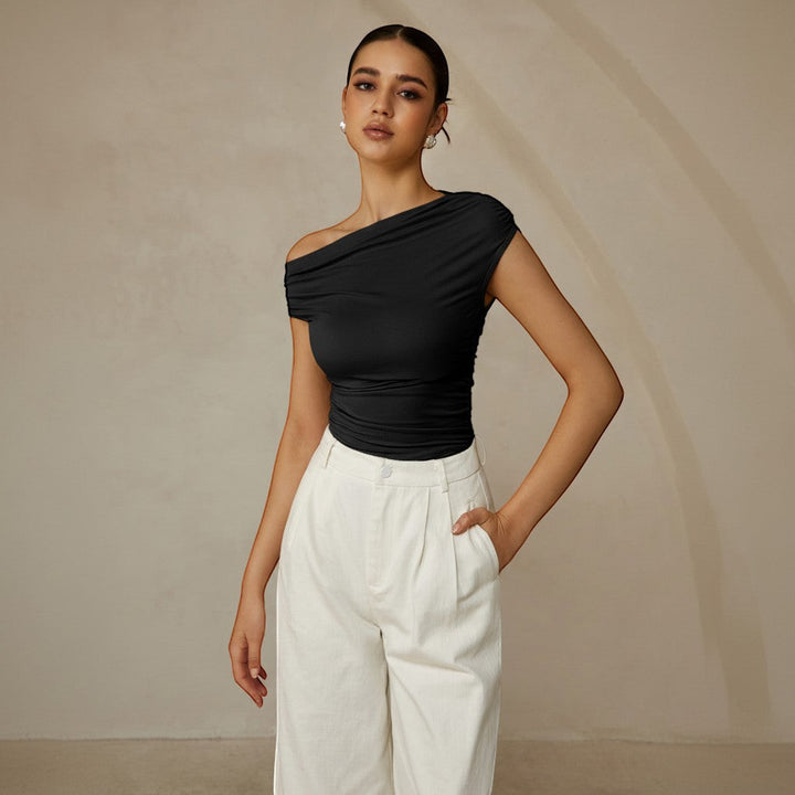 Summer-ready light green one shoulder top, fitted & ruched, with a unique asymmetrical neckline.