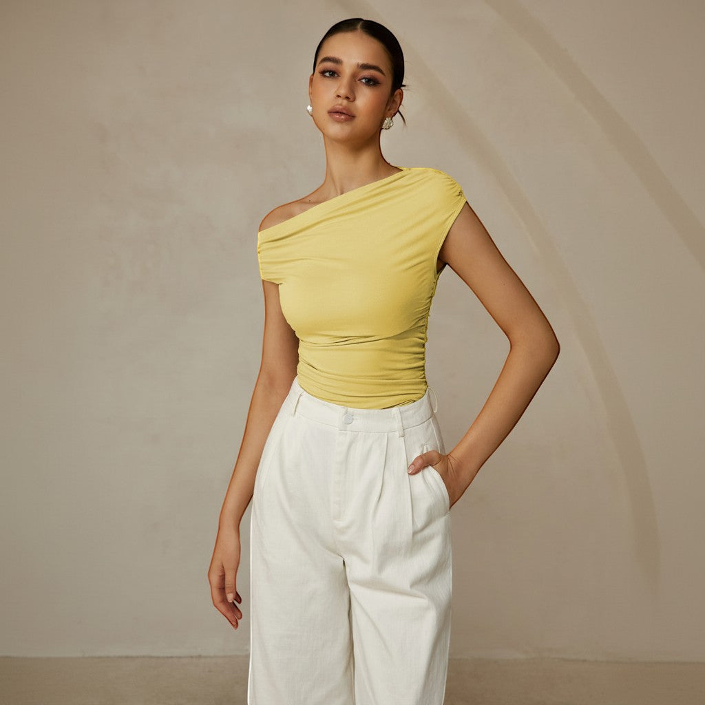 Elegant black one shoulder ruched top, fitted silhouette & asymmetrical neckline for women.