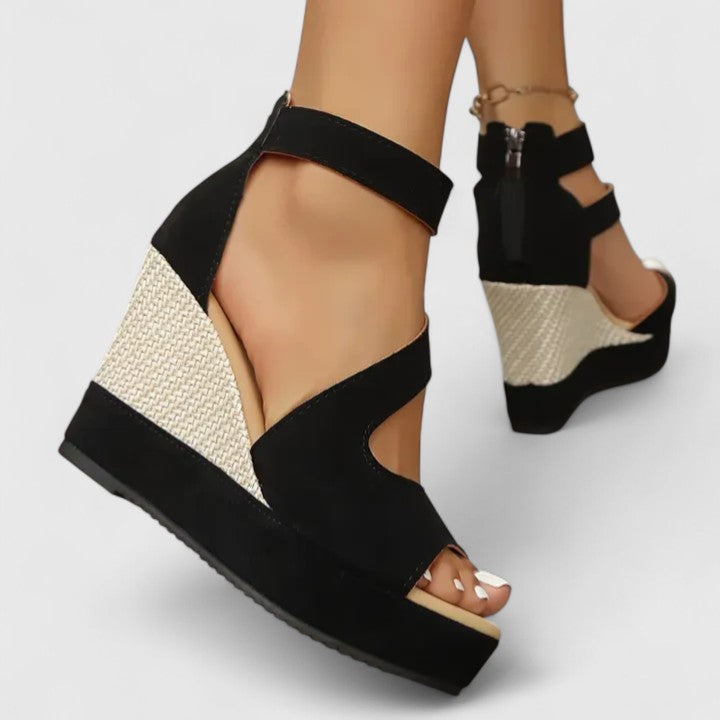 Women's comfortable black orthopaedic wedge sandals with elastic straps and arch support for active wear.
