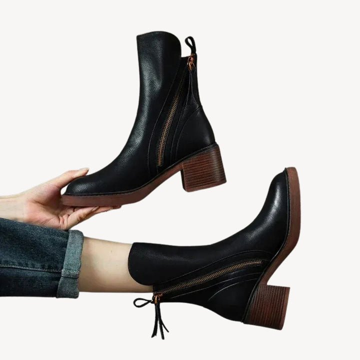 Black women's orthopedic ankle boots offer all-day comfort & support, perfect for stylish everyday wear.