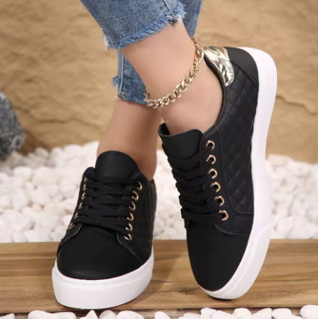 Women's black orthopedic sneakers, offering superior comfort and pain relief for plantar fasciitis and walking.