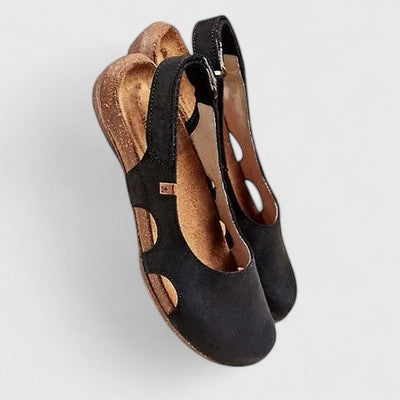 Black women's sophisticated comfort sandals with arch support & adjustable strap for all-day walking.