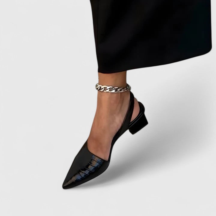 Black women's supportive heels for all-day comfort. Elegant orthopaedic dress shoes with arch support.