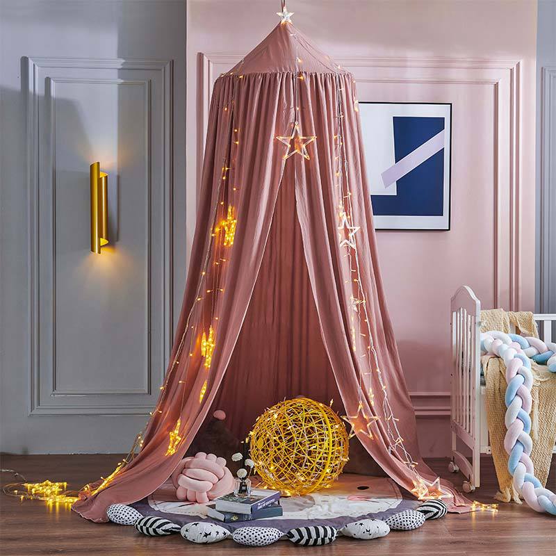 Kids' light-blocking bed tent canopy, ideal for sleep, reading, and imaginative play; nursery decor.