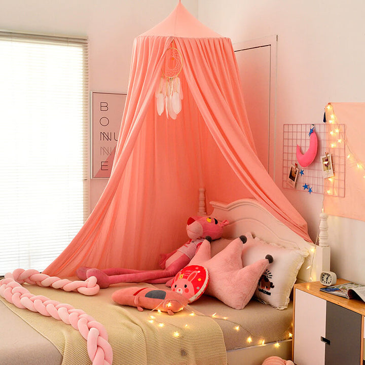 Blackout bed canopy with attached fairy lights, adding a touch of magic to a child's sleep space.
