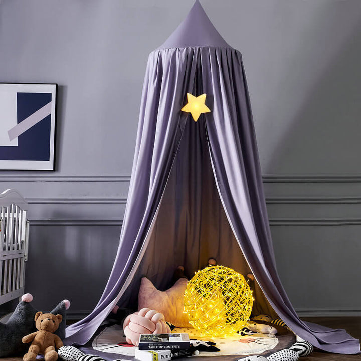 Child's blackout canopy tent with fairy lights inside, perfect for a magical cozy play nook.